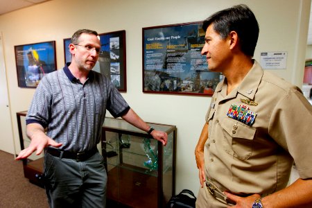 US Navy 110720-N-HW977-134 Capt. Jay Kadowaki, right, commanding officer of Naval Surface Warfare (NSWC) Center, Corona Division, meets with Robert photo