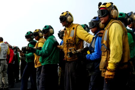 US Navy 110718-N-SB672-004 Sailors and Marines simulate fighting an aircraft fire on the flight deck of the aircraft carrier USS Ronald Reagan (CVN photo