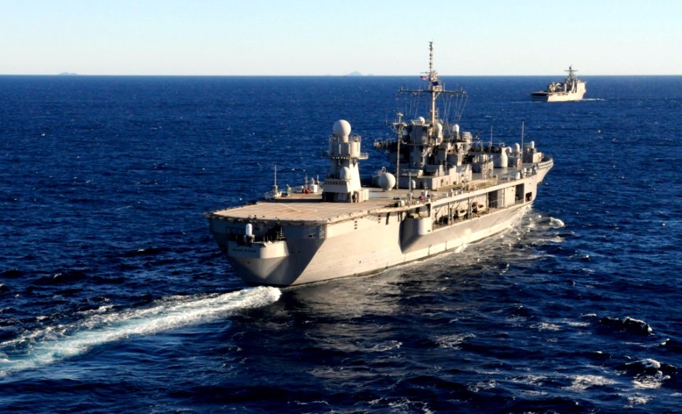 US Navy 110722-N-XG305-526 The U.S. 7th Fleet command ship USS Blue Ridge (LCC 19) transits alongside the amphibious dock landing ship USS Germanto