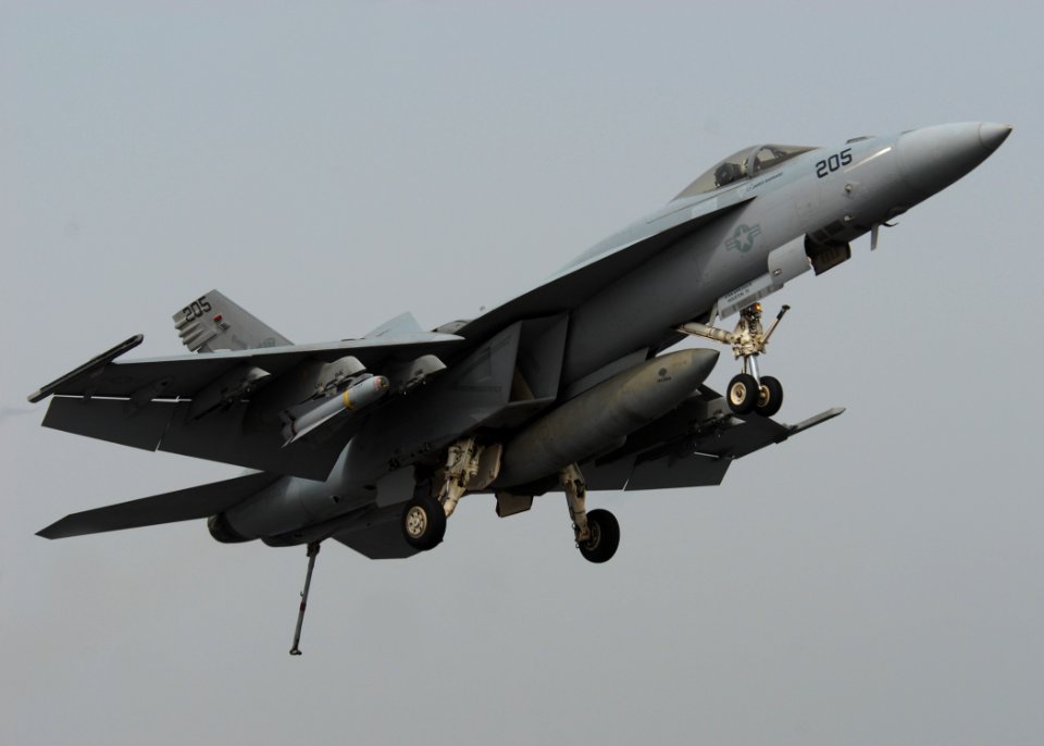 US Navy 110718-N-SG869-115 An F-A-18E Super Hornet assigned to the Argonauts of Strike Fighter Squadron (VFA) 147 prepares to land aboard the aircr