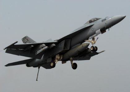 US Navy 110718-N-SG869-115 An F-A-18E Super Hornet assigned to the Argonauts of Strike Fighter Squadron (VFA) 147 prepares to land aboard the aircr