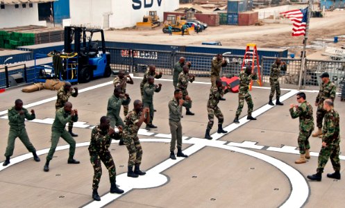 US Navy 110720-N-XK513-100 U.S. Navy instructors from Maritime Civil Affairs Security Training (MCAST) conduct self-defense training with members o