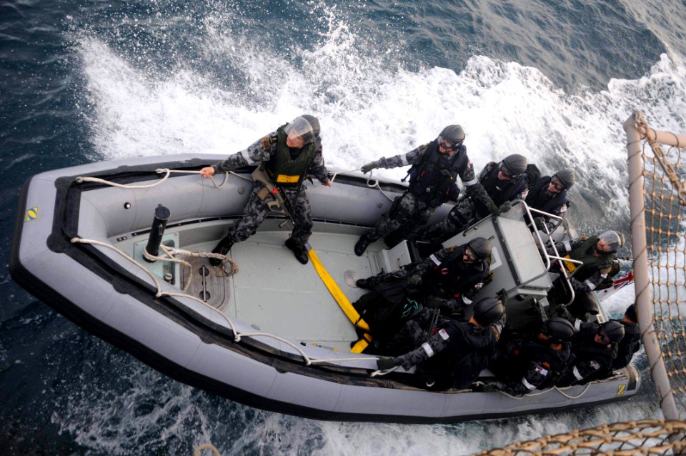 US Navy 110722-N-IO627-008 Royal Australian Navy sailors assigned to the visit, board, search, and seizure (VBSS) team of the Australian navy friga