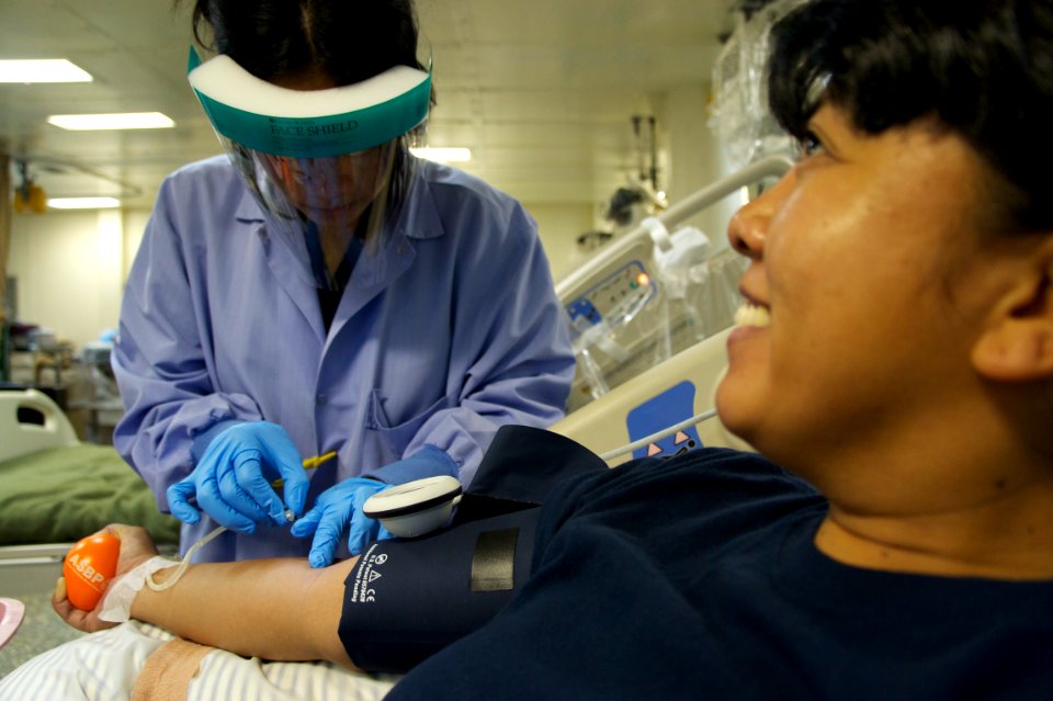 US Navy 110720-N-ZC343-843 Mass Communication Specialist 1st Class Jannell Alvarez has blood drawn during a blood drive aboard the amphibious assau