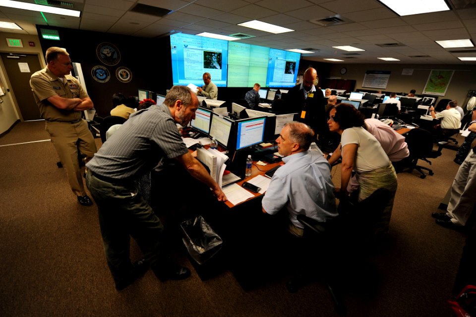 US Navy 110719-N-ZZ999-013 Military and civilian personnel from Navy Region Northwest work in the regional operational command center on Naval Base