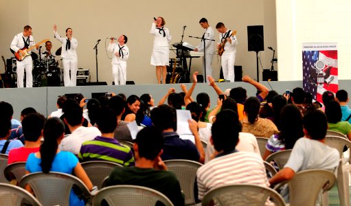 US Navy 110721-N-EP471-005 The U.S. Fleet Forces Band performs at the La Construccion del Nuevo Instituto Tecnologico de Chalatenango during a Cont photo