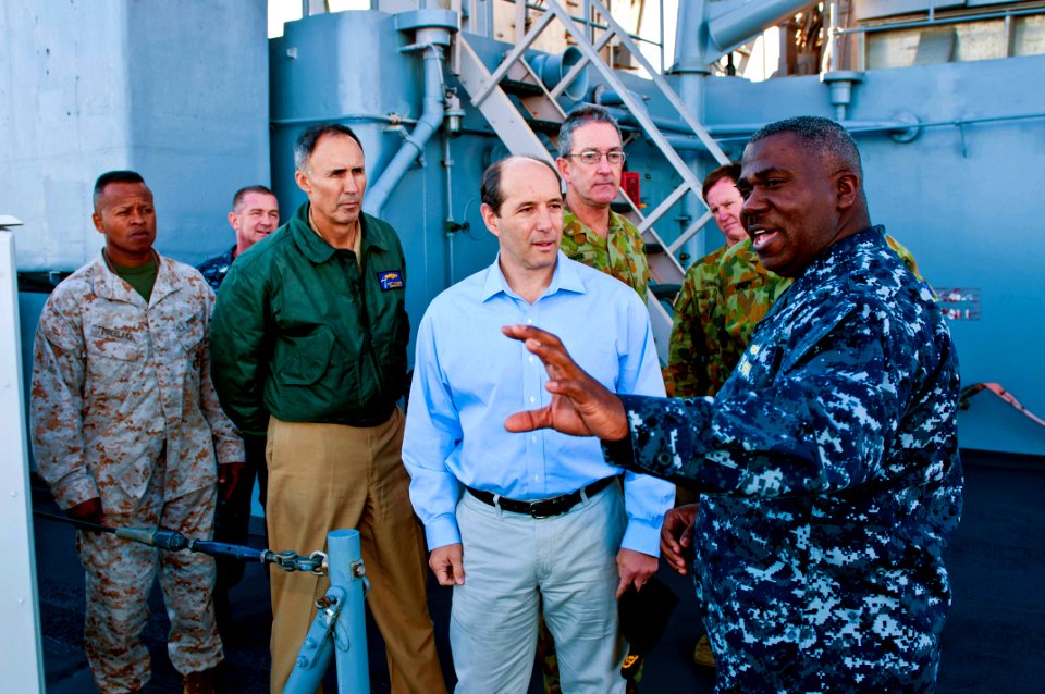 US Navy 110722-N-CZ945-112 Cmdr. Antonio D. Hull explains features of the ship's weapon system to U.S. Ambassador to Australia Jeffery L. Bleich