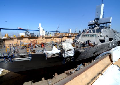US Navy 110720-N-DI719-012 The littoral combat ship USS Freedom (LCS 1) continues a scheduled four-month maintenance period in a dry dock at Naval
