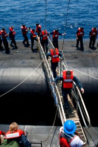 US Navy 110720-N-FG395-028 Navy ROTC midshipmen transfer from the Ohio-class ballistic-missile submarine USS Rhode Island (SSBN 740) to the Militar