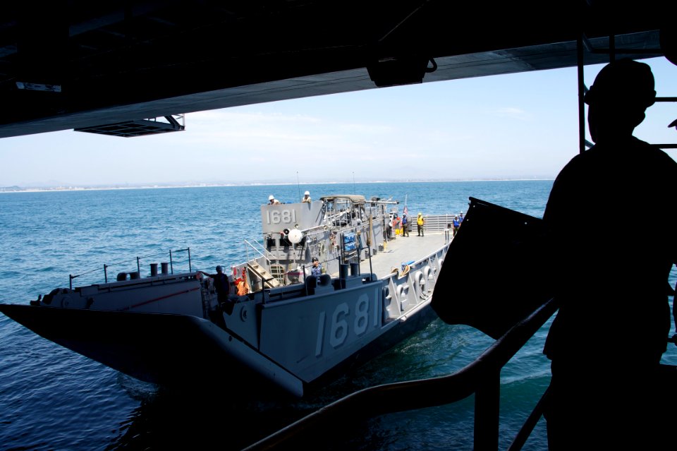US Navy 110725-N-ZC343-217 A landing craft utility (LCU) enters the well deck of the amphibious assault ship USS Bonhomme Richard (LHD 6)