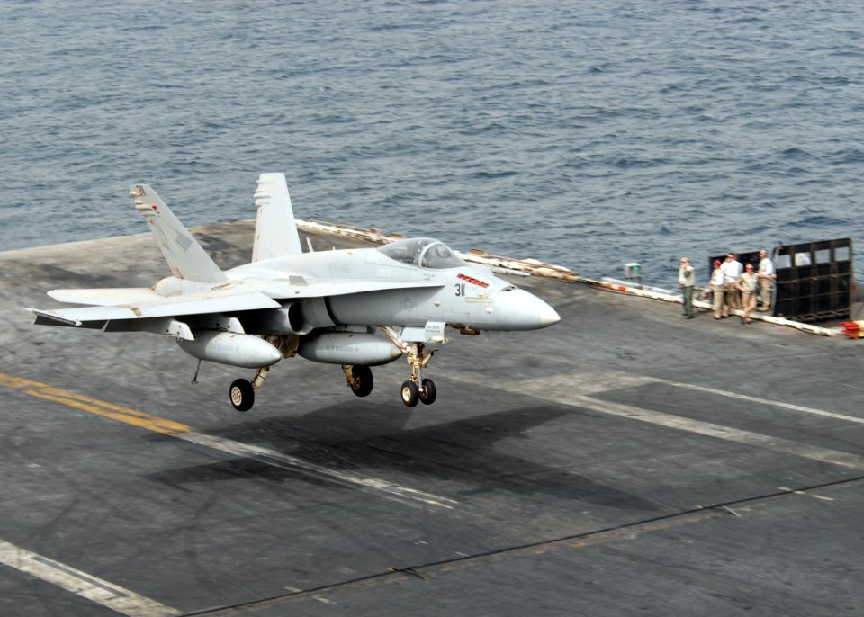 US Navy 110722-N-SG869-303 An F-A-18C Hornet assigned to the Blue Diamonds of Strike Fighter Squadron (VFA) 146 lands aboard the aircraft carrier U