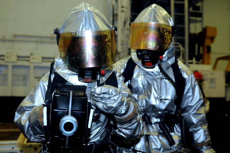 US Navy 110720-N-QL471-004 Sailors use a Naval Firefighter's Thermal Imager (NFTI) during hangar bay drills aboard the aircraft carrier USS George