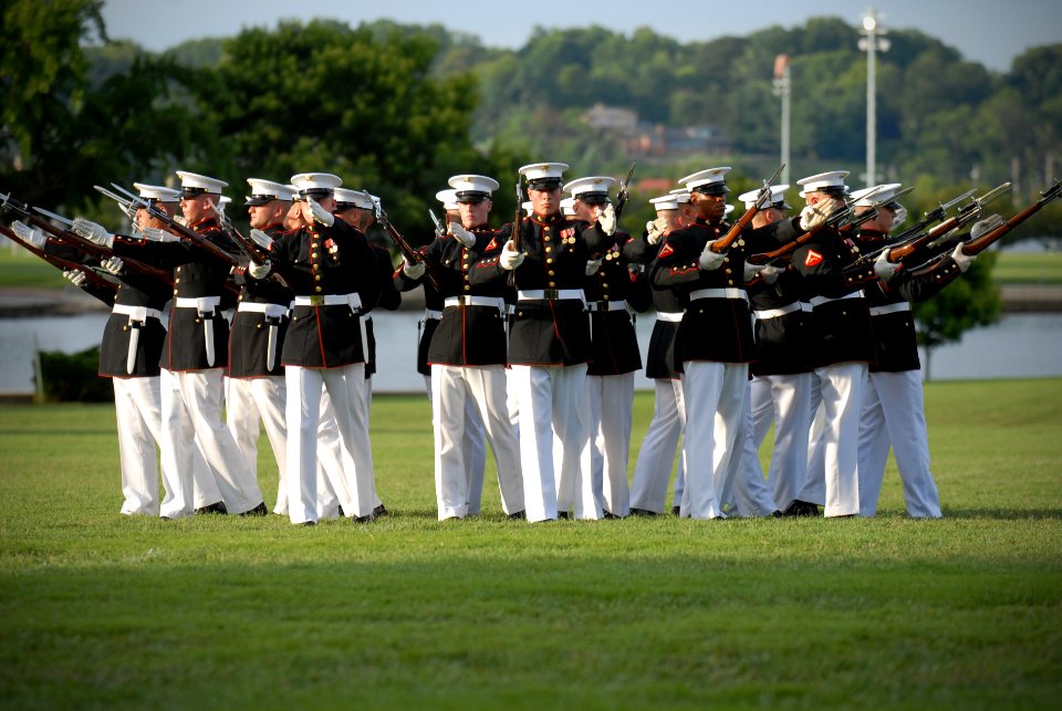 US Navy 110727-N-OA833-005 Members of the U.S. Marine Corps Silent Drill team perform at the U.S. Naval Academy for the Class of 2015