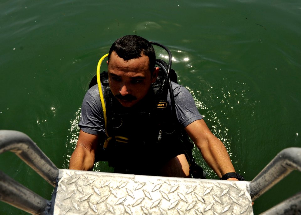 US Navy 110727-N-KB666-092 Joni Paniagua exits the water after conducting lift bag operations with Mobile Diving and Salvage Unit (MDSU) 2