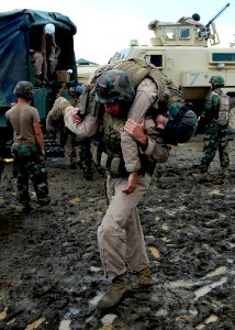 US Navy 110729-N-SD610-001 Construction Mechanic Constructionman Dylan Kilby, assigned to Naval Mobile Construction Battalion (NMCB) 7,