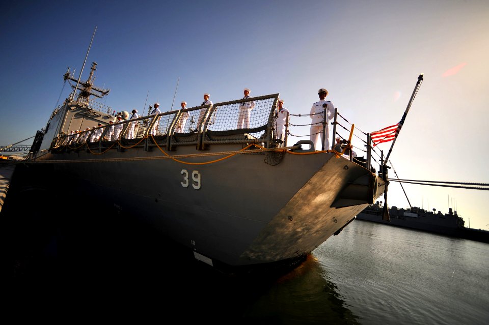 US Navy 110729-N-YR391-005 Sailors assigned to USS Doyle (FFG 39) man the rails during the ship's decommissioning ceremony at Naval Station Mayport