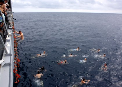US Navy 110724-N-ZI300-013 Sailors aboard the guided-missile frigate USS Thach (FFG 43) participate in a swim call during the photo