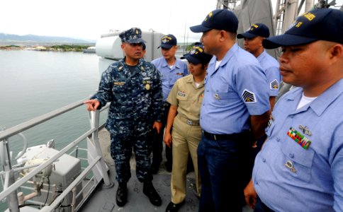 US Navy 110729-N-WX059-126 Senior Chief Johannes Gonzalez leads sailors from the Philippine navy on a tour of the guided-missile frigate USS Rueben