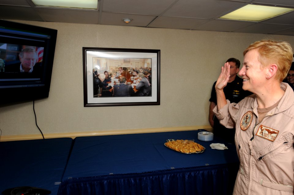 US Navy 110731-N-XE109-002 Former President George H.W. Bush promotes Rear Adm. Nora W. Tyson
