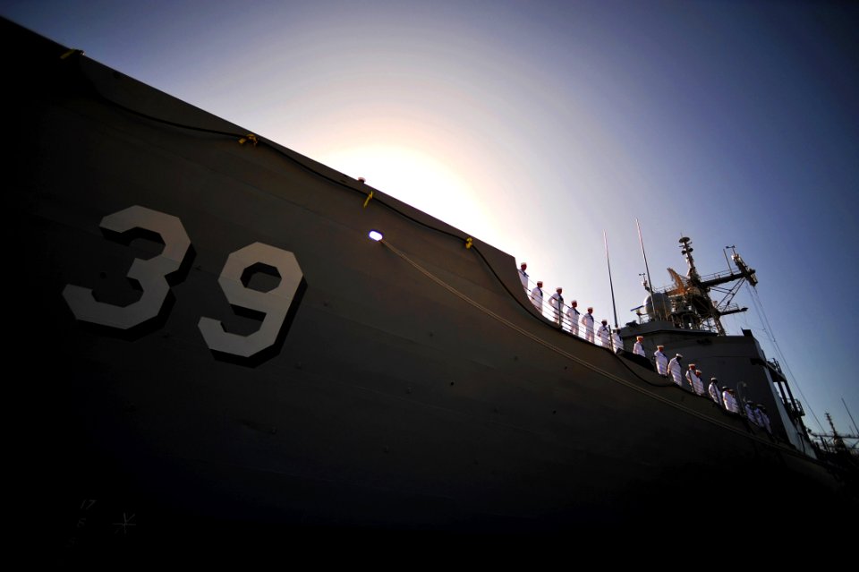 US Navy 110729-N-YR391-008 Sailors assigned to USS Doyle (FFG 39) man the rails during the ship's decommissioning ceremony at Naval Station Mayport