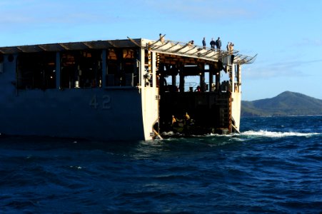 US Navy 110730-N-WA347-151 An amphibious assault vehicle enters the well deck of USS Germantown (LSD 42), marking the completion of exercise Talism
