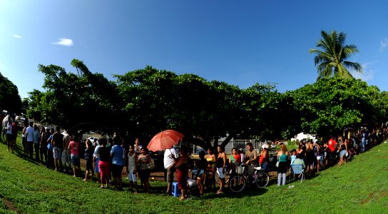 US Navy 110803-N-NY820-015 Patients wait in line outside of the Escuela Fray Casiano de Madrid medical site in Puntarenas, Costa Rica, during Conti photo