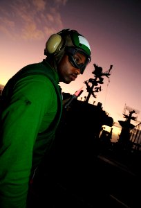 US Navy 110804-N-ZZ999-076 Aviation Boatswain's Mate (Equipment) 2nd Class Ashawn Robertson participates in flight deck drills aboard USS John C. S