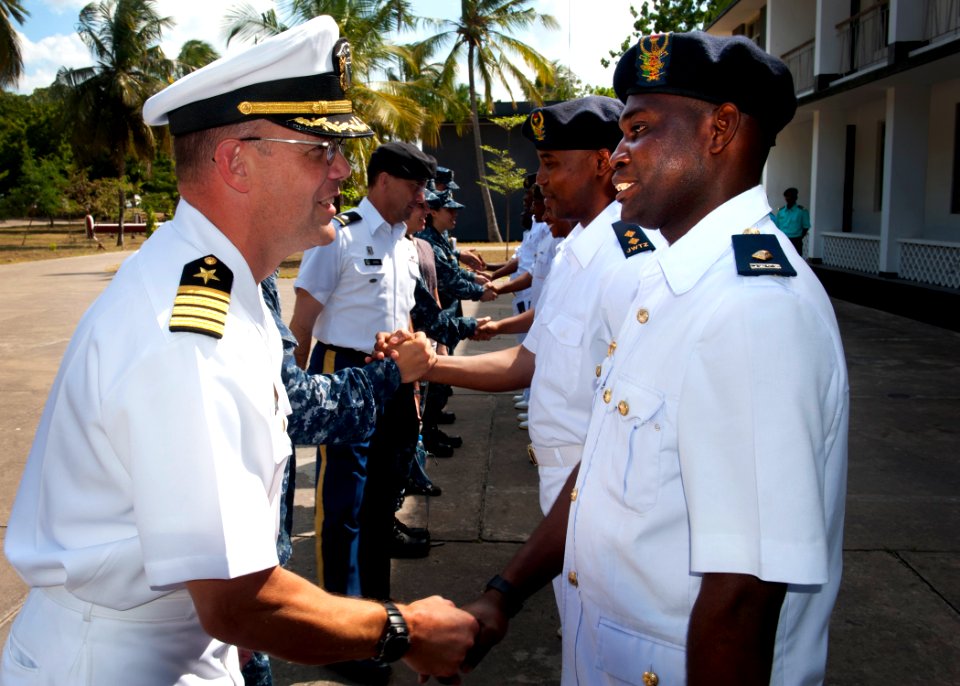 US Navy 110803-N-OV802-085 Capt. Dan Shaffer, left, shakes hands with Maj. Gen. Saidi Shabani Omar during an office call with members of the Tanzan