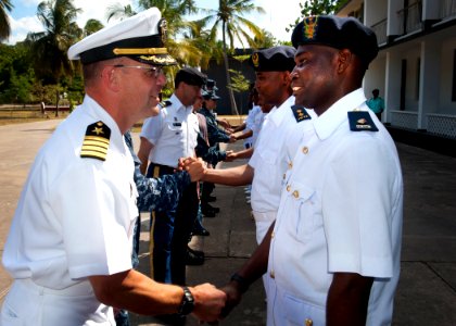 US Navy 110803-N-OV802-085 Capt. Dan Shaffer, left, shakes hands with Maj. Gen. Saidi Shabani Omar during an office call with members of the Tanzan