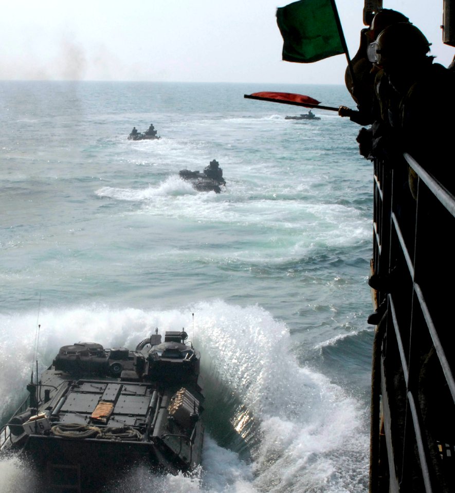 US Navy 110730-N-GH121-081 Marines assigned to the 22nd Marine Expeditionary Unit (22nd MEU) launch amphibious assault vehicles from the amphibious