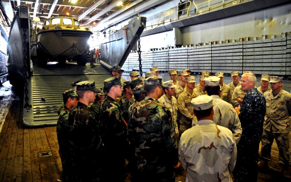 US Navy 110803-N-ZZ999-003 Rear Adm. Gerard Hueber, commander of Expeditionary Strike Group (ESG) 3, talks to crew members of Landing Craft Utility
