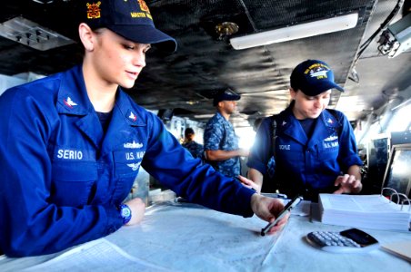 US Navy 110806-N-EE987-024 Quartermaster 3rd Class Kelli Serio, from Tahlequah, Okla., and Quartermaster 3rd Class Jennifer Boyle, from Spokane, Wa