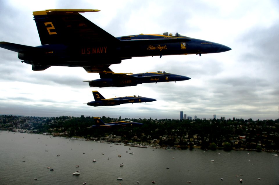 US Navy 110805-N-BA418-128 The U.S. Navy flight demonstration squadron, the Blue Angels, perform a line-abreast flat pass maneuver over Lake Washi