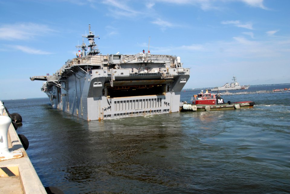 US Navy 110825-N-PS473-128 The amphibious assault ship USS Wasp (LHD 1) departs Naval Station Norfolk ahead of Hurricane Irene