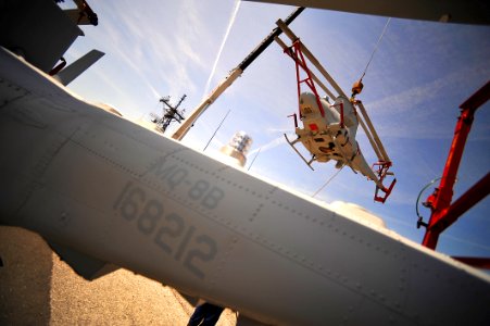 US Navy 110803-N-YR391-144 Two MQ-8B Fire Scout unmanned air vehicles are cranned off the flight deck of USS Halyburton (FFG 40)