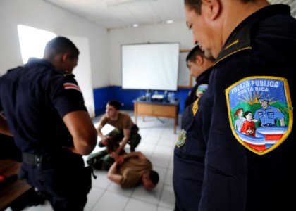 US Navy 110809-N-NY820-177 Sailors participate in a subject matter expert exchange with local police in Puntarenas, Costa Rica, during Continuing P photo