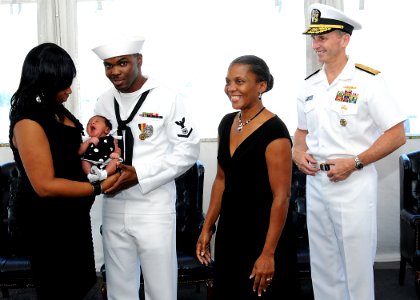 US Navy 110810-N-FC670-017 Vice Chief of Naval Operations (VCNO) Adm. Jonathan Greenert stands with Master-at-Arms 3rd Class Quentin Benjamin and f