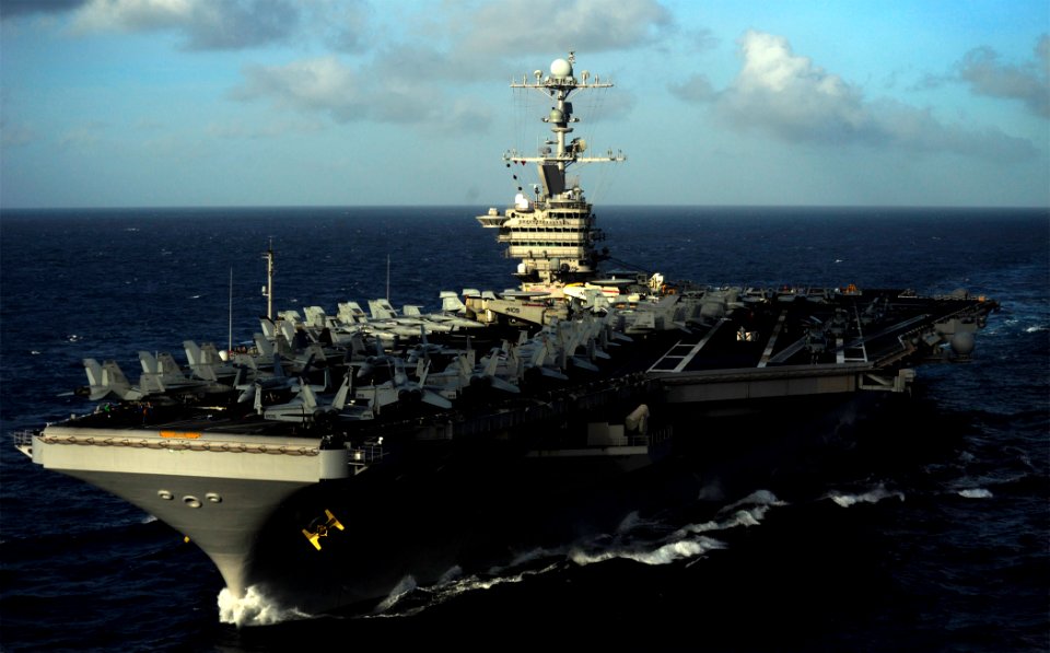 US Navy 110807-N-ZZ999-590 The Nimitz-class aircraft carrier USS John C. Stennis (CVN 74) transits the Pacific Ocean during a replenishment at sea