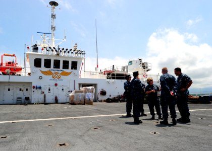 US Navy 110809-N-QD416-049 Rear Adm. Elizabeth Niemyer speaks with Commodore Brian Nickerson aboard USNS Comfort (T-AH 20) photo