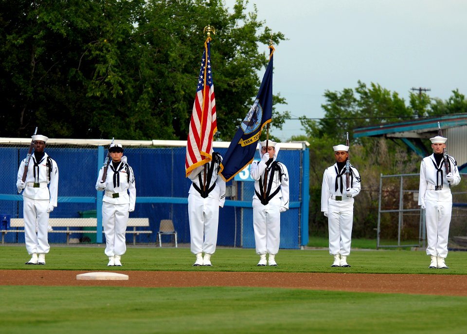 US Navy 110806-N-JP983-006 Members of the color guard assigned to Naval Medical Center Portsmouth parade the colors before a Norfolk Tides