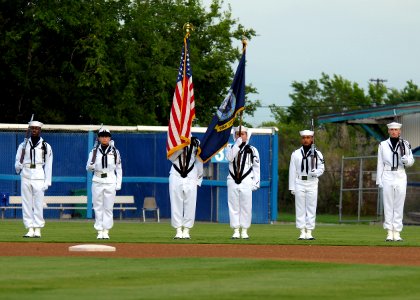 US Navy 110806-N-JP983-006 Members of the color guard assigned to Naval Medical Center Portsmouth parade the colors before a Norfolk Tides