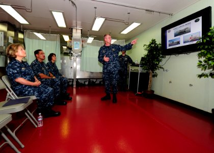 US Navy 110809-N-QD416-028 Capt. David Weiss briefs Rear Adm. Elizabeth Niemyer on the capabilities of USNS Comfort (T-AH 20)
