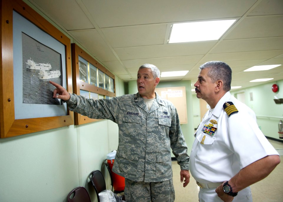 US Navy 110810-N-RM525-245 Capt. Andrew Bouchard, from Novato, Calif., gives Costa Rican Coast Guard officials a tour aboard the Military Sealift C