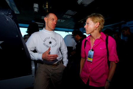 US Navy 110805-N-AW206-056 Rear Adm. J.R. Haley, commander of Task Force (CTF) 70, speaks with U.S. Ambassador to Thailand Kristie A. Kenney