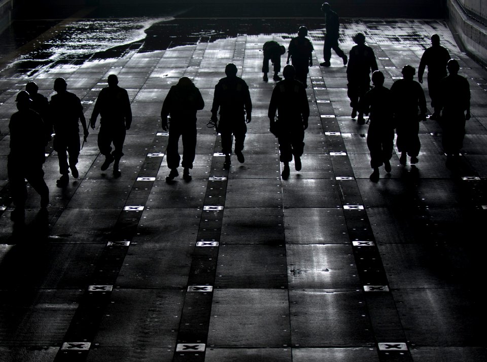 US Navy 110810-N-PB383-364 Sailors conduct a foreign object damage walk down in the well deck aboard USS New Orleans (LPD 18)