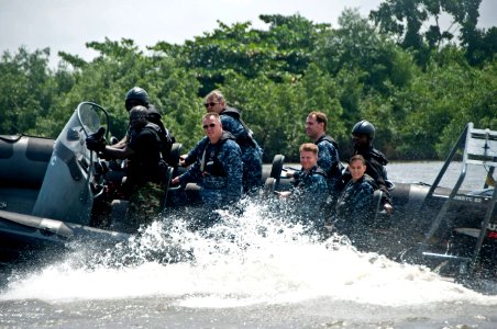 US Navy 110808-N-XK513-331 Rear Adm. Kenneth J. Norton, along with other U.S. Navy personnel, ride with a Nigerian visit, board, search and seizure photo