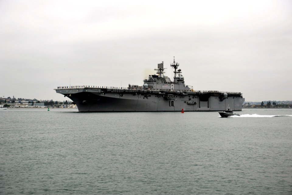 US Navy 110810-N-KS651-191 Sailors and Marines man the rails aboard USS Makin Island (LHD 8)