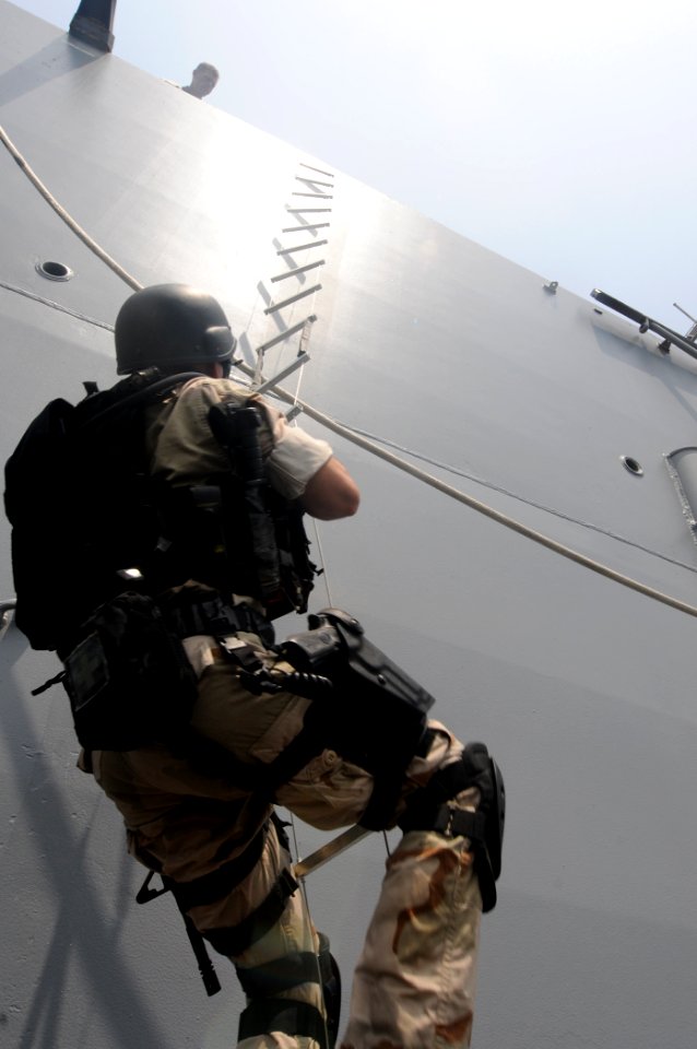 US Navy 110820-N-QL471-154 Lt. j.g. Patrick Nolan, a member of the visit, board, search and seizure team aboard the guided-missile destroyer USS T