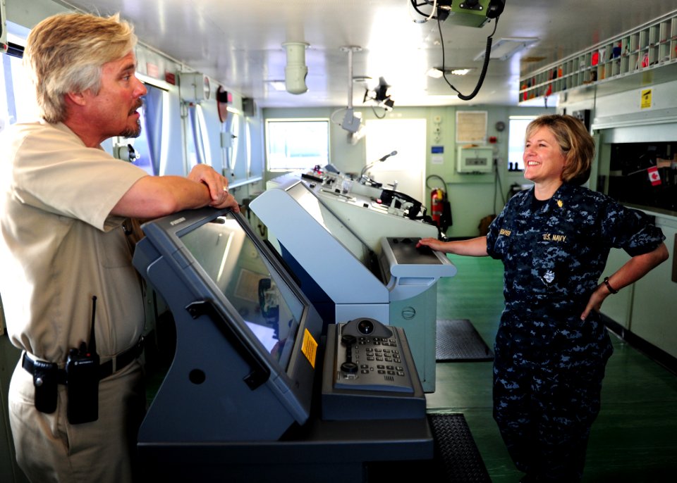 US Navy 110809-N-QD416-056 Civilian Capt. Randall Rockwood gives Rear Adm. Elizabeth Niemyer a tour of USNS Comfort (T-AH 20)