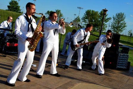 US Navy 110810-N-CI293-267 Navy Band Great Lakes, Horizon, performs for visitors at the Red River Zoo during Fargo Navy Week